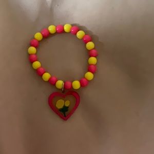 Heart bracelet with charm